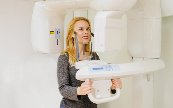 Marietta Dental Professionals patient having dental xrays taken with panoramic 3D cone beam